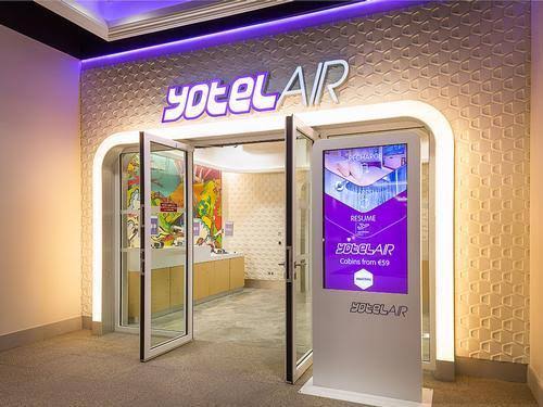 The entrance and compact cabins inside an airport terminal at YOTELAIR Paris Charles de Gaulle, Paris, France
